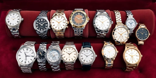 Elegant luxury fashion watches on a velvet surface.