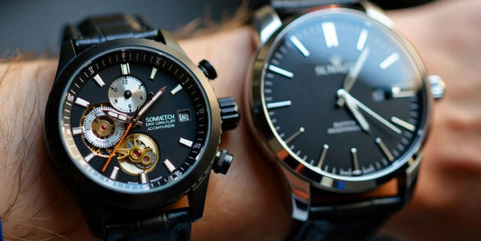 Two wristwatches side by side